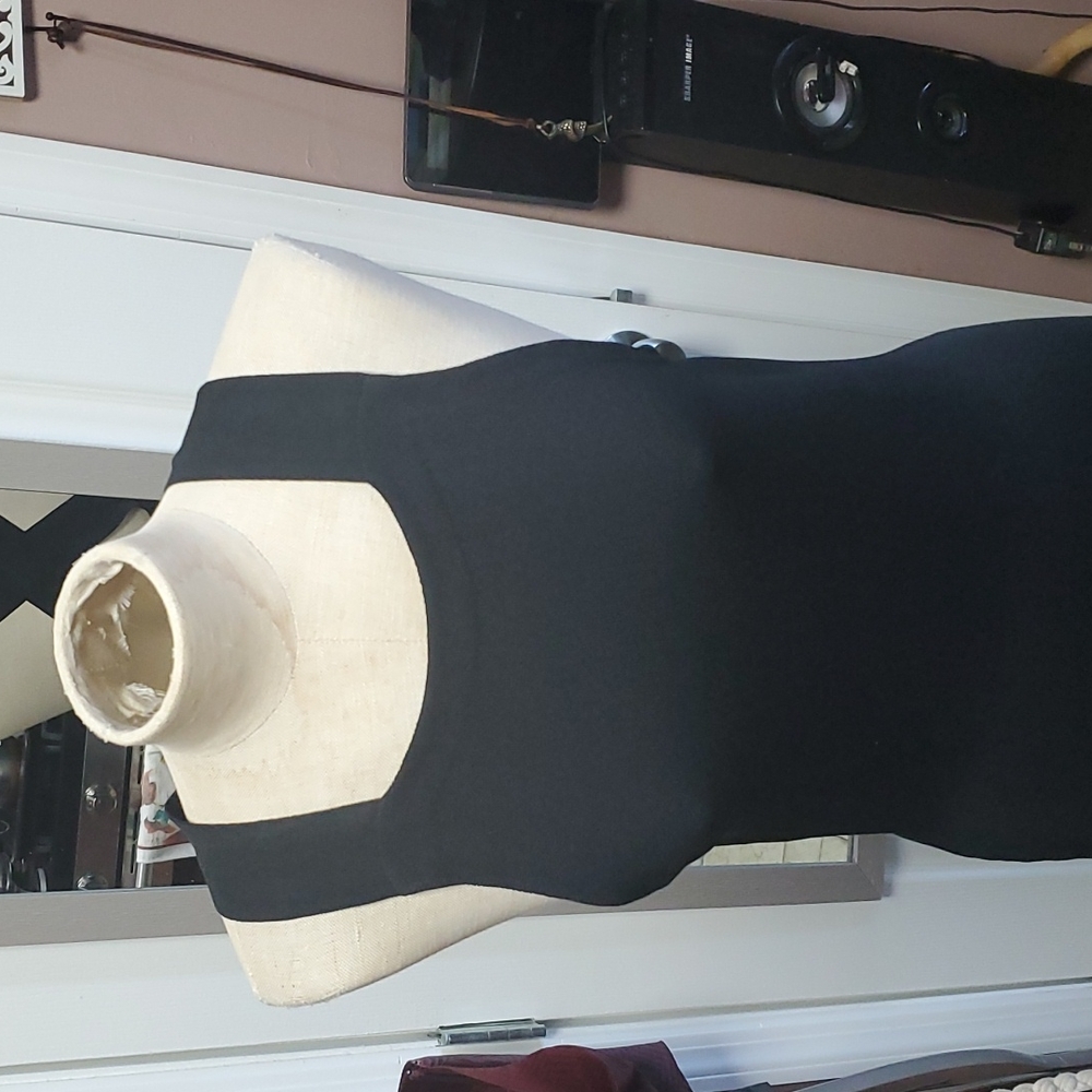Rachel Roy long dress crisscross on the back.